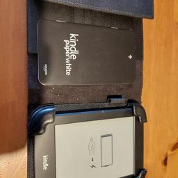 Amazon Kindle power white like new used less than 6 times. Comes with a USB charger (not original)
