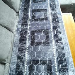 Steel Grey/Blue Black So Soft Velvety Touch Thick Wide Runner Rug Designer Style

Measurements are 90cm x 190cm.

Brand new So Soft big floor runner rug, velvety to the touch with shine threading/edges. Honeycomb and floral pattern ingrained with greek style black pattern. Steel grey/blue colour with black. Dot grippers at the back to reduce slipping. There may be uneven stitching but rug is all intact. A little pull on the thread on one edge.

If interested message me or send me your number.