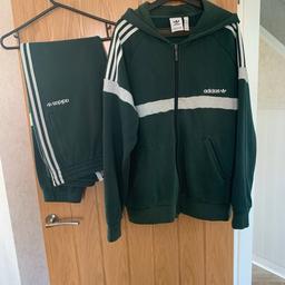 mens addidas tracksuit large
excellent condition
string missing from top see pic
dark green and grey in colour
cuffed bottoms
from a clean smoke free home