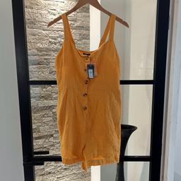 Brand new with tags ladies/ girls mustard short dungarees with tie belt size 12 , never worn excellent condition from pet and smoke free home DY6