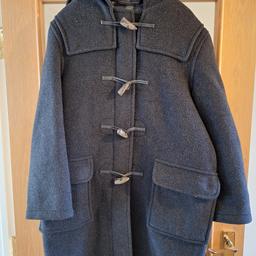 Black hooded duffle coat with zip and tusk fastening, outer pockets, inner zipped pocket.

Size 38

Original Montgomery

Hand made in England

Dry clean only

70% wool
15% polyester
10% polyamide
5% acrylic

In good condition

Collected £45