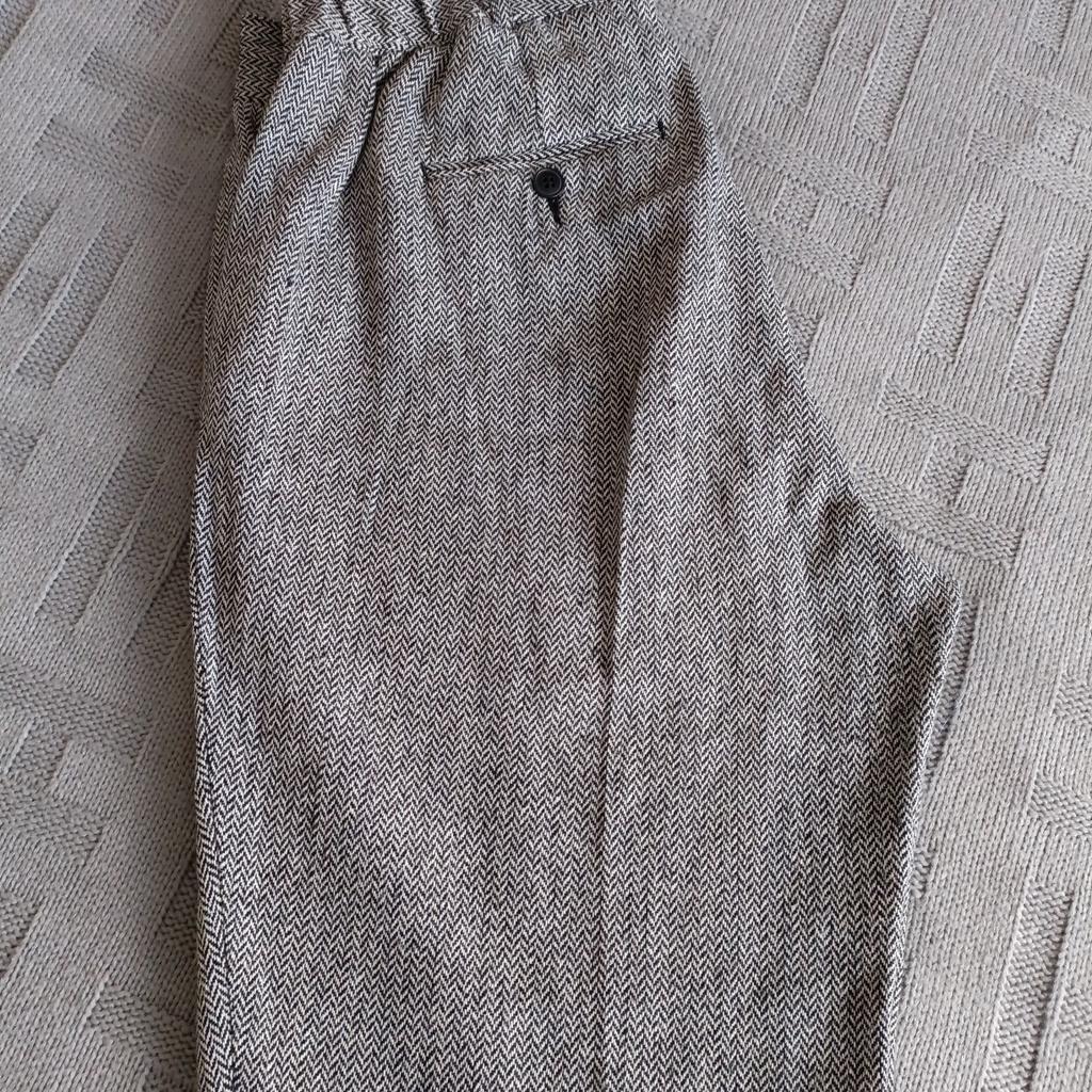 size 14 cotton traders wool chevron patterned trousers. selling due to weight loss. 28 inch inside leg.
