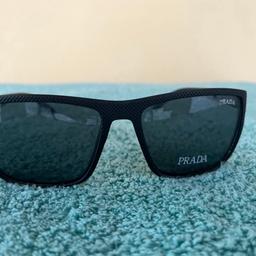 Brand new 
Prada Sunglasses 
Got black lens 
Based in Blackburn