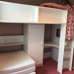 Cabin bed Rutland make, will need to dissemble yourself and will need cleaning as stickers, pen, paint marks on. Pics are when first got it. Has mattress for top and has 2 part section mattresses for bottom if needed. 