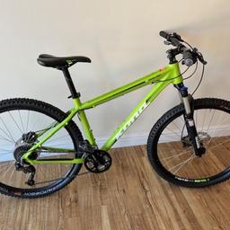 Kona Cinder Cone hardtail mountain bike in slime green colour. Genuinely used a handful of times (hence the sale). This is in excellent condition. Always cleaned and maintained well and stored indoors.

Scandium aluminium frame (17”; roughly medium). Some measurements (mm): reach, 413; top tube, 597; chainstay, 425; wheelbase, 1092; standover, 755.

Rockshox 30 silver forks (100 mm travel). 9 x 3 gears (Shimano HG200 11-34 cassette). 27.5” WTB rims fitted with Hutchinson Toro XC hardskin tubeless ready tyres (new and unused). I’ll also include, lightly used, one front Maxxis Ardent 2.25" and one rear Maxxis Crossmark 2.1" tyres and a brand new, unopened spare KMC chain. Shimano Alivio front derailleur and Deore Shadow rear derailleur. Shimano PD-EH500 pedals (very lightly used). Shimano Acera shifters (hydraulic brakes) and WTB saddle.

Cash or bank transfer on collection. This is a lot of bike for the money and is in tip top condition. Pick up only! Inspection welcomed.