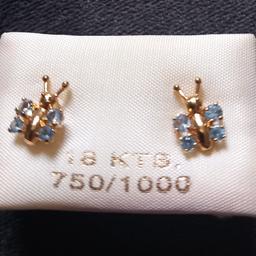 New 18ct gold butterfly earrings, fully stamped on backs for 18ct gold, 1.4 grams, unsure of stones which are light blue, any questions please ask.