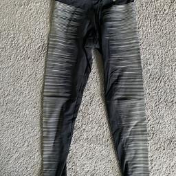 Black and grey Nike leggings