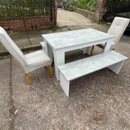 table with 2 bench 
and 2 chairs 
in good used condition 
Pick up or delivery available for petrol cost Thank you 😊 Cash only please 😊
Manchester