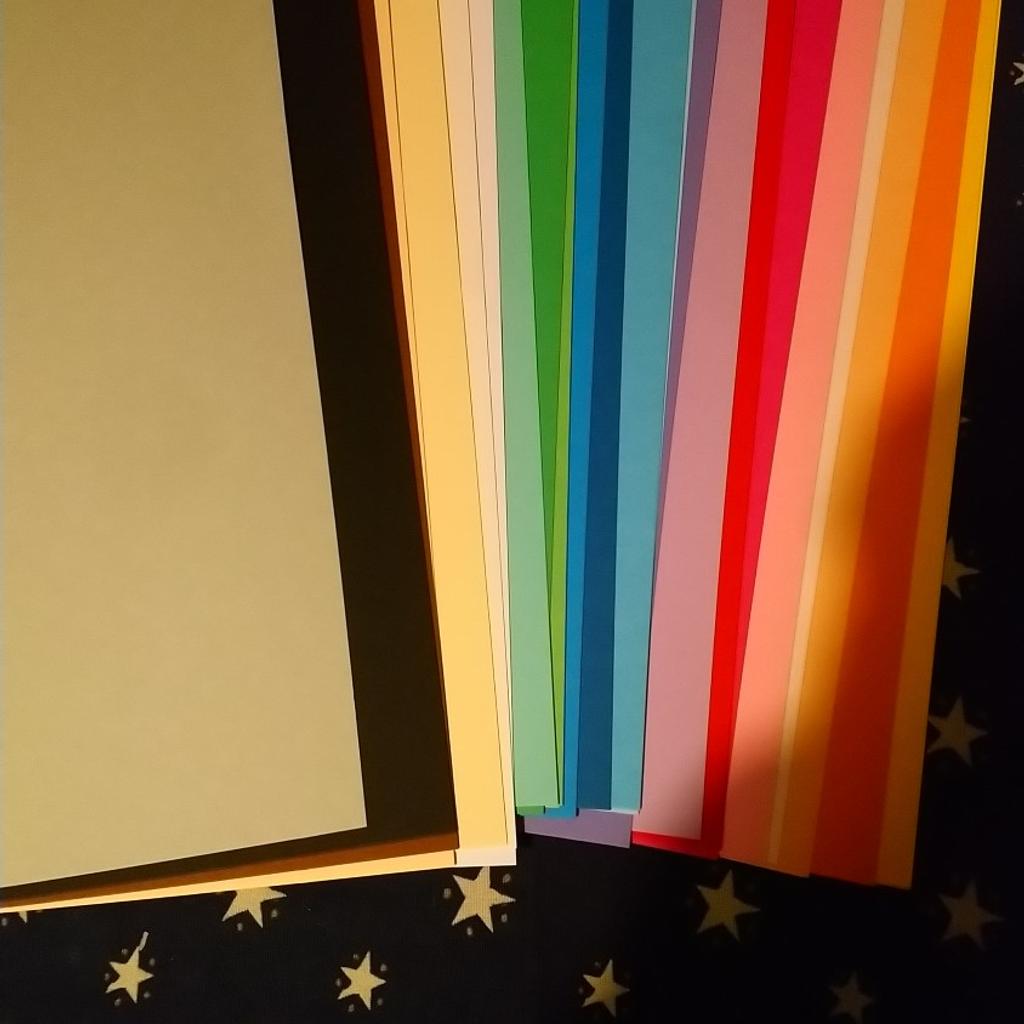24 sheets of coloured card. Size is 24x35cm