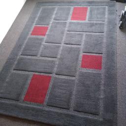 immaculate quality rug 90" x 62". virtually unused rolled up in the spare room cost new 155