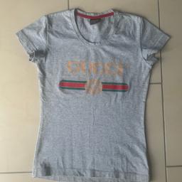 Gucci Damen T-Shirt
Grau
Größe 34/36, XS/S

Privatverkauf -> keine Garantie oder Rücknahme!