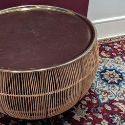 Rattan and gold coloured metal tray Coffee Table. The tray is detachable. 57cm diameter, 36cm High. Some minor scratches on the tray. Brand new retails for £130+. Collection only
