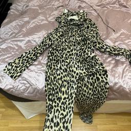 Leopard onesie from top shop 
Poppers to fasten at the front 
Feet Intact with non slip grip on the bottom 
Hood with ears