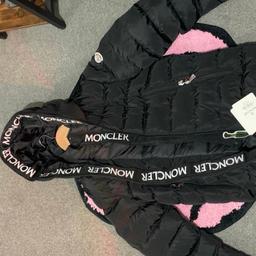 Real coat. Only this cheap because a small tear in the right arm which has been repaired with glue. Other than that Perfect condition only used twice. Still has tags. I have receipt for proof of purchase.