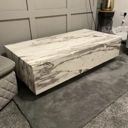 Marble coffee table. Very strong quality. Reluctant in selling but havent got space :( :(

EXTREMELY HEAVY, YOU WILL NEED 2 OR 3 PEOPLE TO CARRY THIS, I CANNOT HELP UNFORTUNATLY.

Measures:
Height: 35cm x width: 120cm x Depth: 60cm

very small damage nothing major see last pic.
Collection LE5