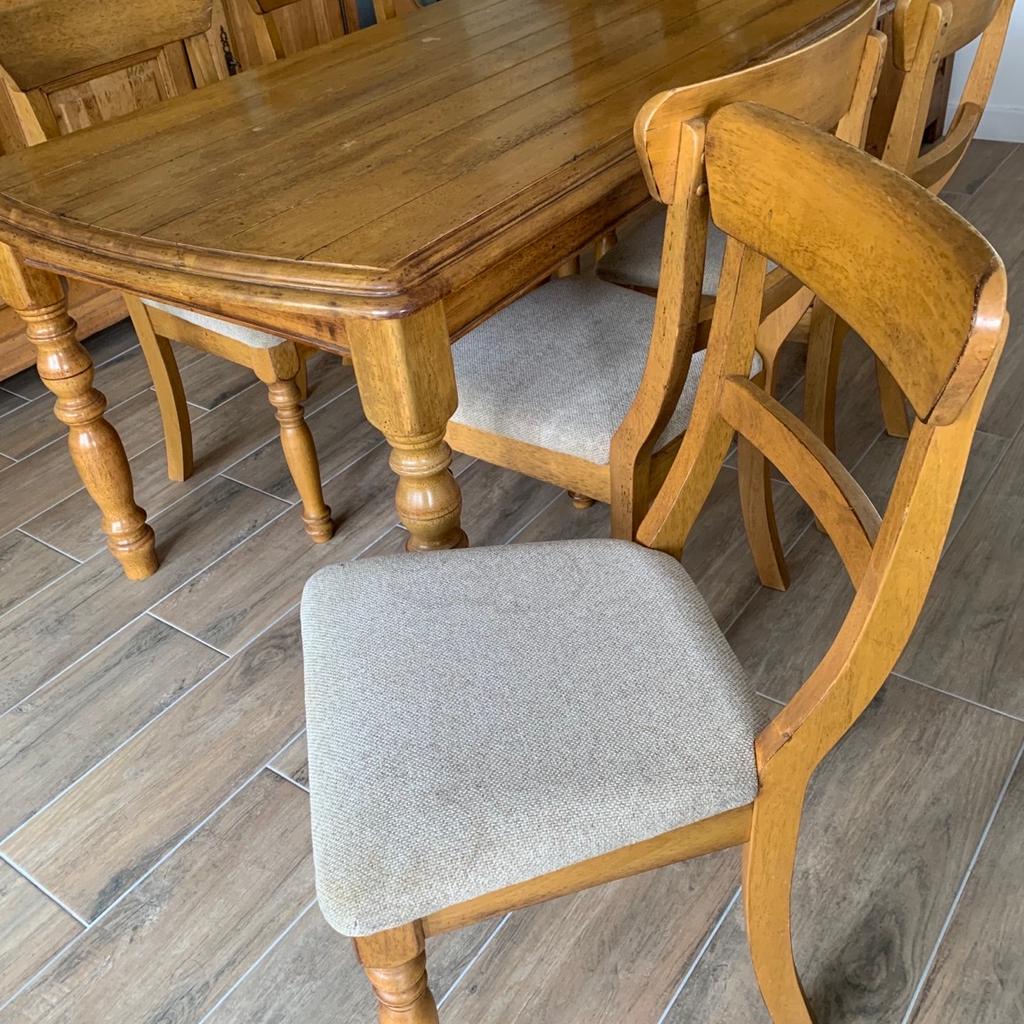 This is a distressed farmhouse oak family dining table and chairs purchased from Arighi Bianchi minor marks on chairs due to storage