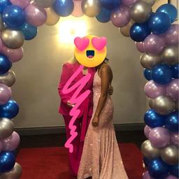 Beautiful, one shoulder/sleeveless ,baby pink sequins dress . It has build in bra , worn only once for a prom . In perfect condition. We have paid £130 for the dress . 
Label says size 6 , but the true size is 8 . 
Measurements : 
Front 145cm 
Full length 178cm 
Bust 40cm (stretches to 45cm )
If you have any other questions please don’t hesitate to ask .