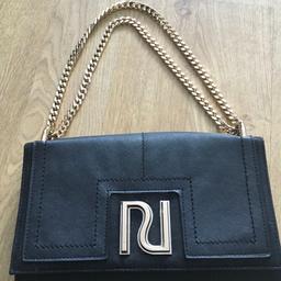 River island 
Black and Gold bag
Clutch style
Gold Chain handle
RI on front
See all photos