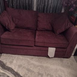 Two seater double sofa bed. plumb colour. re advatised do to being let down.168cm long 86cm wide 79cm tall 