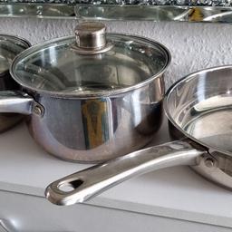 A pot set comprising of 1 small,  & 1 medium pot, also 1 frying pan in silver/chrome. Can be used on any hobb including induction