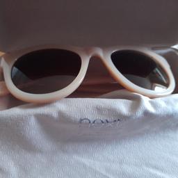 A stunning pair of next sun glasses hand made ,in a champagne colour ,with the box and cloth ,never used just stored..PayPal or bank transfer or collection only, postage to be paid.