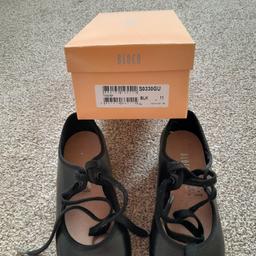 Girls black tap shoes, size 11. Hardly used as needed bigger size. Excellent condition. Bloch brand. 