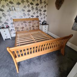 Kingsize oak bedframe. Good condition. Requires 1 new bolt due to screw head rounded off. Dismantled, buyer to collect. Cash on collection.