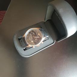 Armani watch mens 
new was a gift 
never worn so will sell sell  open too offers