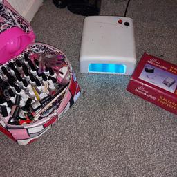 Electric nail  file set, good working order and loads of files with it 

Uv lamp working fine 

Loads of colours of gel paint for uv set  been used but alot haven't either lots of paint left in them all 

Lots of Gems and Glitter 

2 x hand soaks