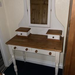 Pine upcycled dressing table 2 drawers. Has a waxed top with chalk painted framework and legs/2drswers. 90cm wide x 48cm depth x 77cm tall. Pine Mirror with drawers .Buyer must collect.