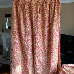 Professionally made, made to measure, weighted, fully lined door curtain in Terracotta and cream patterned, slubbed chenille material.

Heading is triple pinch pleat, trimmed with covered buttons.

Dimensions:

2m 3cm drop x 4m width (pulled width 2m 12cm currently)

Including matching edged lined and stiffened tie back (76cm long) with buttoned detail , complete with circular fastening hooks.

Matching pair of fully lined patterned curtains (1.40m drop x 1.30m width each curtain) with tie backs are also available

In good condition from smoke free home.

Buyer to collect from Bingley.