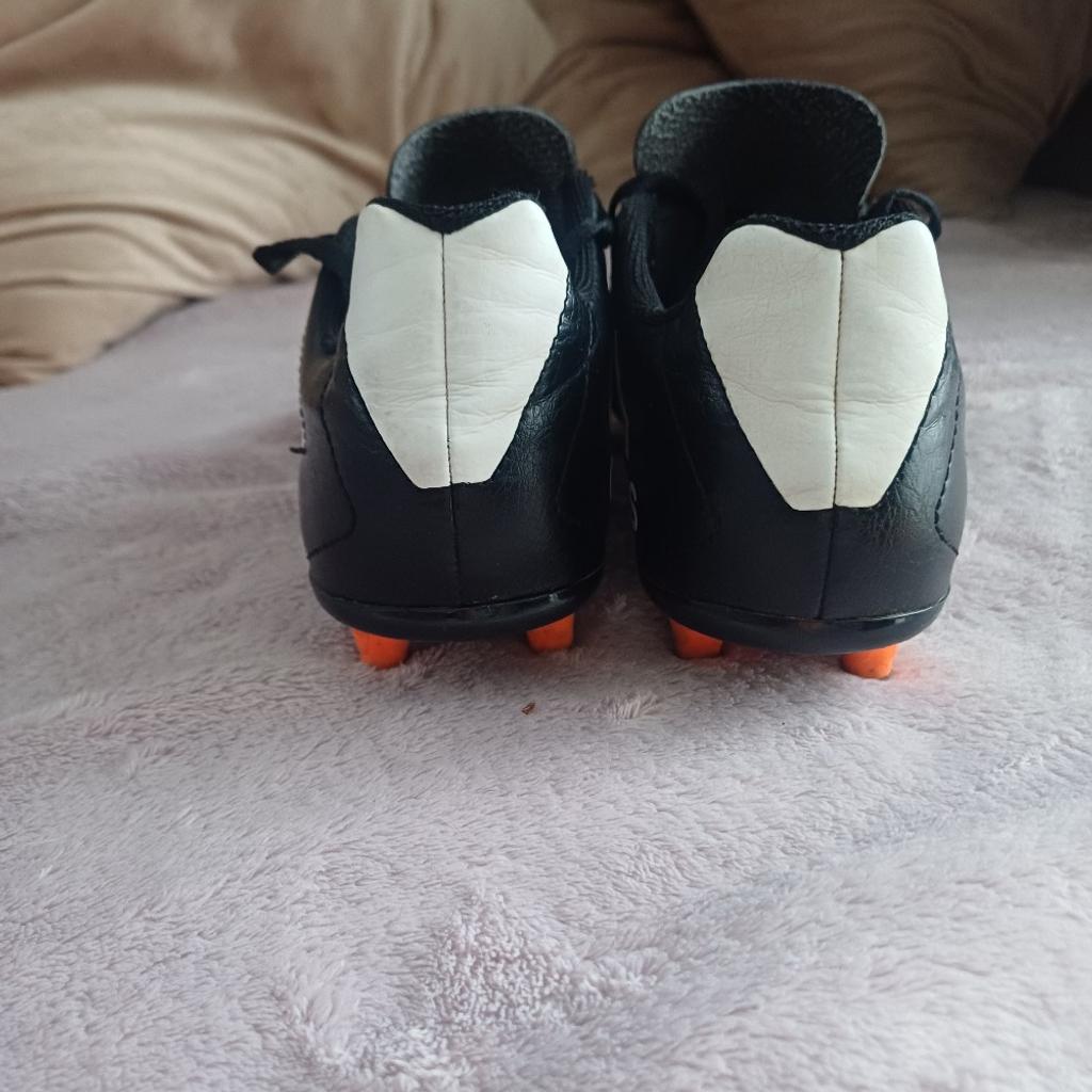 adidas older boys size 4 football boots,in good clean condition,studs are in good condition but can be changed if you want to,cash on collection only from brierleyhill area ..