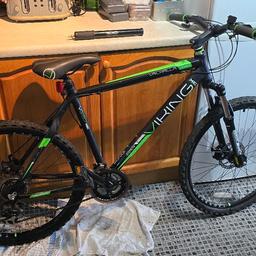 brand new mountain bike only unpacked comes with bike pump, helmet and riding gloves. cash on pick up only