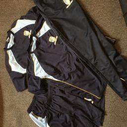 Bought these for grandson from the school uniform shop in Hyde, then he moved schools. Think sone weren’t even worn! I have 2 pairs of shorts waist 38 inches. 2 Top 42/44 Inches. 1 pair of Tracksuit Bottoms Size 34/36 inches (not been worn)! Will sell for £5 an item which is an absolute bargain! Collect Dukinfield. Thanks