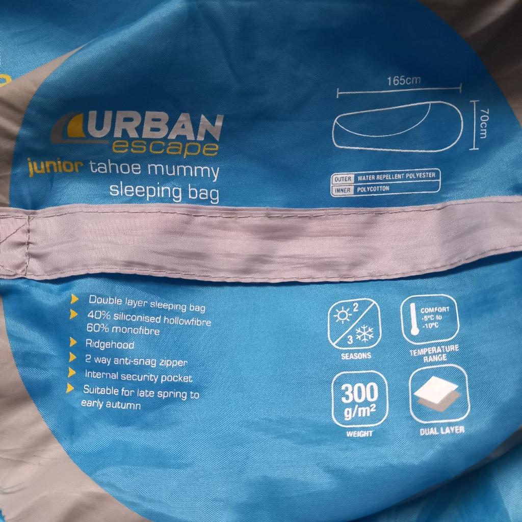 Urban escape Junior Tahoe mummy sleeping bag. Dual layer sleeping bag with drawstring bag. Bag has handle for easy transportation.

Great condition.

300 g/m². Suitable for late spring to early autumn.
Internal security pocket. Ridgehood. 2 may anti-snag zipper. Approx. 165cm in length and 70cm wide at the top end. Machine washable.

Have 4 available. £7.50 each.

OL7 area. Can combine postage