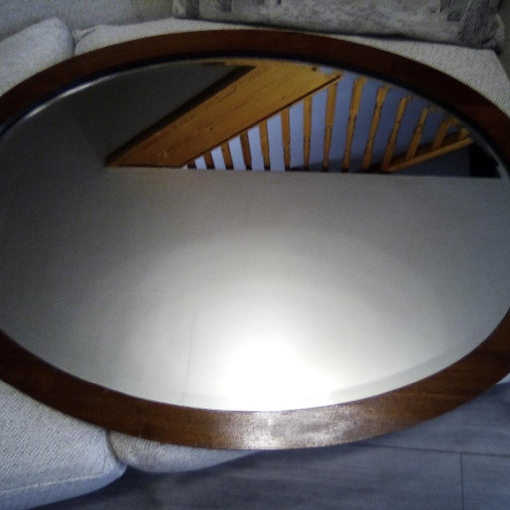 retro dark wood mirror. very good condition. wooden backed with chain hanger.collect please from oxenhope Bradford 22