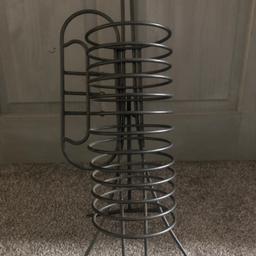 Grey metal CD rack, which holds 12 CDs, which has a stand and folds out.

Attractive trumpet shape design.

Nice!

Condition - used but in great condition.

Free collection from Bradford, West Yorkshire.

Alternatively, I can post out via Royal Mail first class delivery for £4.80 or Royal Mail second class delivery for £4.10.