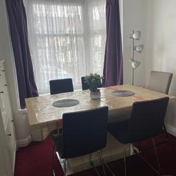 I am selling this dining table( with 4 purple colour chairs) only because I don't have a space in my new property. The seating area in my new property is very small that's why I have to sell my dining table, other than I would never sell it.

I had bought this table from Harveys for £799.

Comes from a pet and smoke-free house.

Visit, view it and then buy it with the peace of mind.
