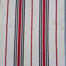 IKEA beige/cream mat x2 in very good condition. 100% cotton, black and red stripes with fringe edges. Can be machine washed. Approx size 55cms x 85cms. Hardly used just been in storage. Both for £5.
