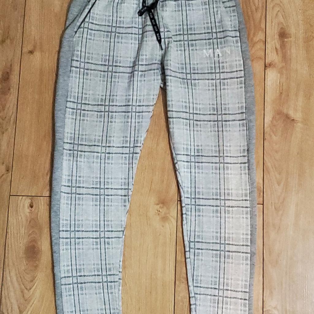 Boohoo MAN size 30 soft touch trousers.