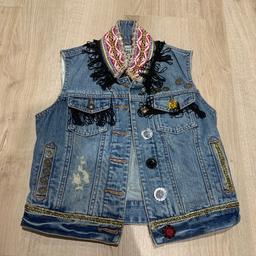 River island waistcoat. Size 8. Very unique. Like new. Only worn once. If you have any questions please ask.