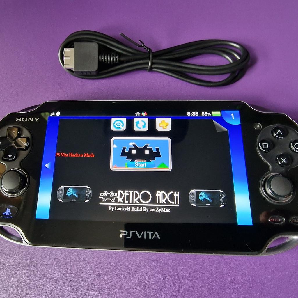 Modded ps vita 128gb. Comes with over 10000 games for lots of different consoles, nes snes, gameboys, arcade, atari, mega drive, master system and many more. Also has freestore to download pretty much all psp, ps1 and vita games. Collection from bd4.