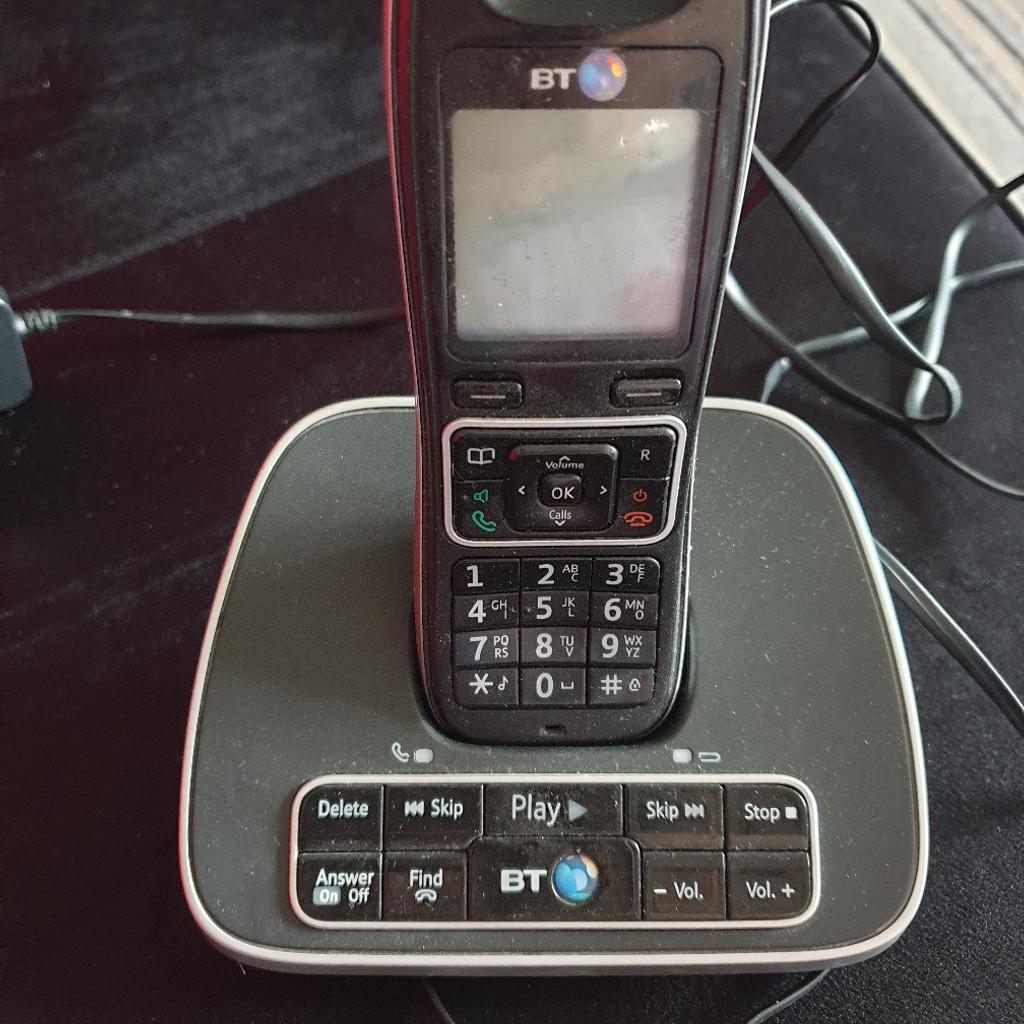 Black BT Telephone with built in answering machine call and retrieve missed messages and calls excellent working condition in black hands free speaker system loud and clear easy to use never miss a call again buyer collects