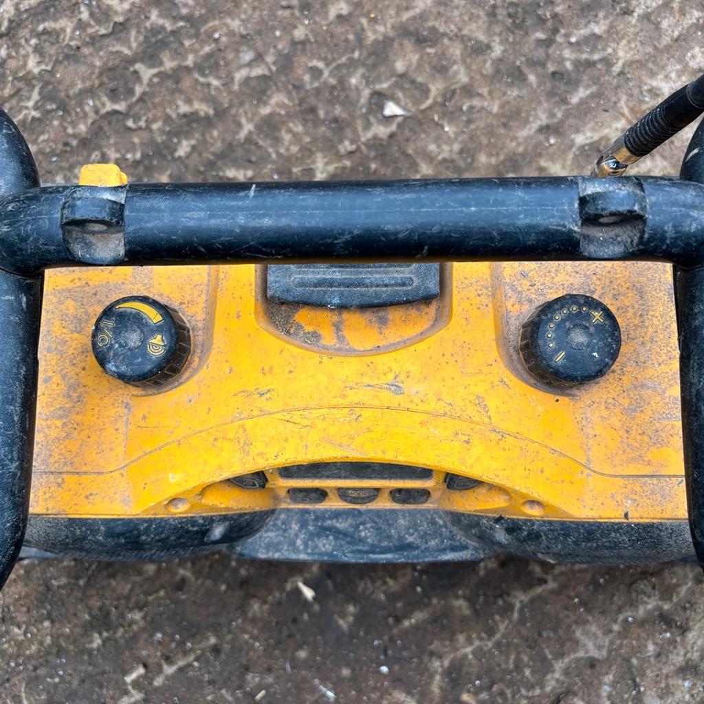 Dewalt site radio dc011 this is just a bit dirt in need of a clean has the cable attached for mains usage ( no battery included) will give it a clean before sale I hasn’t been used for a few years