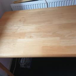  Solid Wood Table & Four Chairs. A great dining set. Table in very good condition, chairs are good but couple of bars underneath the chairs have slight imperfections but they are perfectly functionable. Table measures 45 inches length & 28 inches wide. Only selling as now have a breakfast bar. Table has been dismantled & ready for collection.