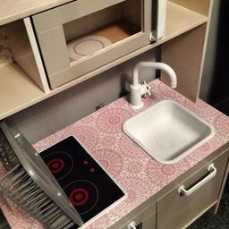 Upcycled kitchen (by me)
Pink and beige with white tap, bowl and hob surround.

Unfortunately the hob lights do not work.
From a smoke free clean home