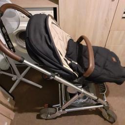 2 in 1 pram. can use with carry cot or remove and use the car seat option. comes with foot muff. rain cover, net for summer. has attachments for car. folds away to fit in car. cup holder on pram handle