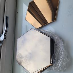 some used hexagon mirror tiles
size of a side plate
10 of them
different shades of copper
