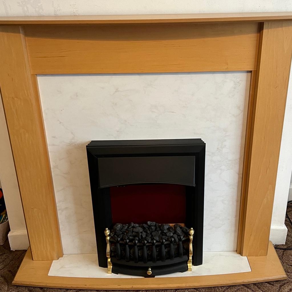 Electric fire with attached surround. Has a few scuff marks at the bottom but in working order. There are 2 heat settings and the lights work. £60 ono
Collection only as it’s heavy.