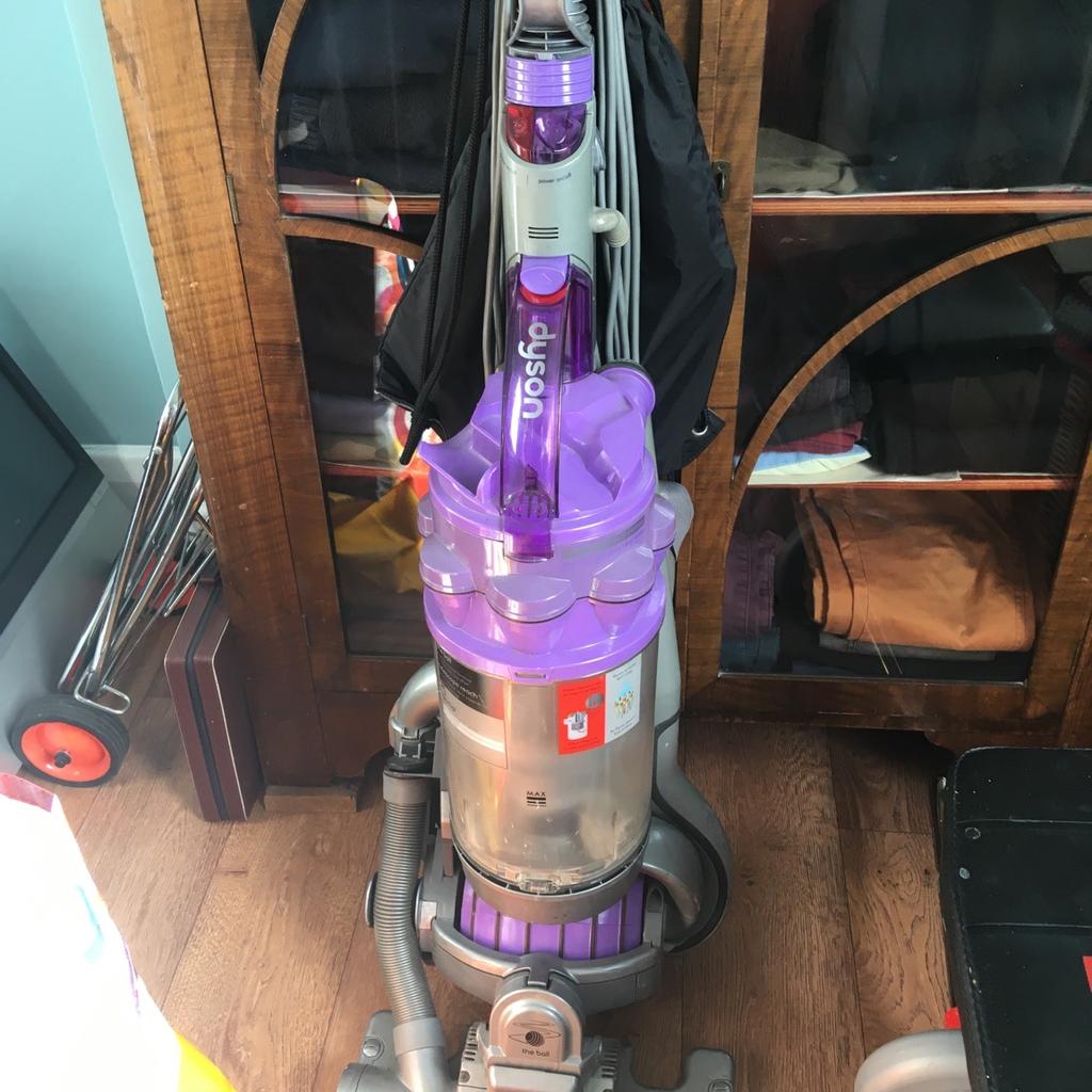 Used Dyson with accessories and instructions. Works okay though visibly worn . Great suction and cleans up to the edge.